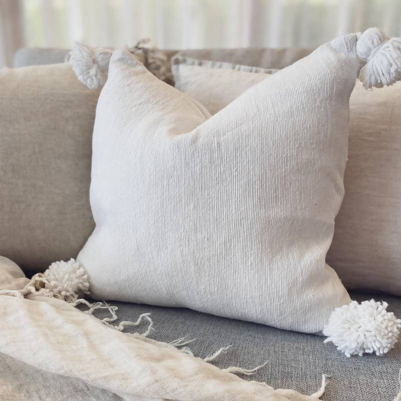 Gray pom pom outlet pillow