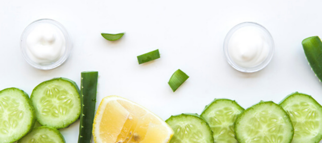 Cucumber slices, lemon, and aloe vera for skincare 
