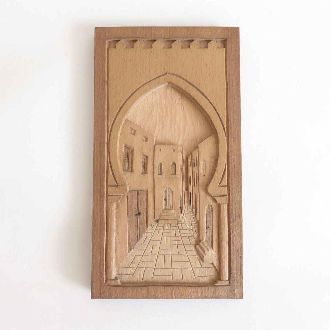 Wood relief carving narrow alleyway (madina)