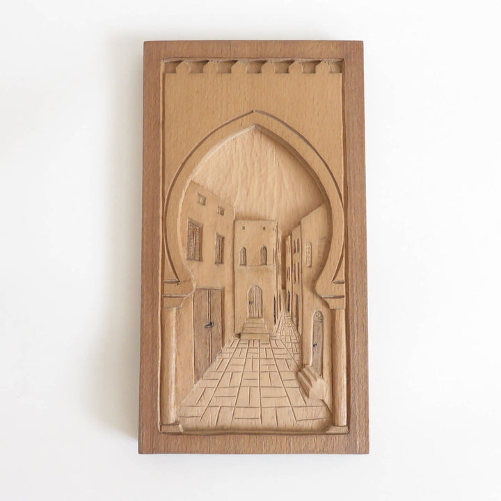 Wood relief carving narrow alleyway (madina)