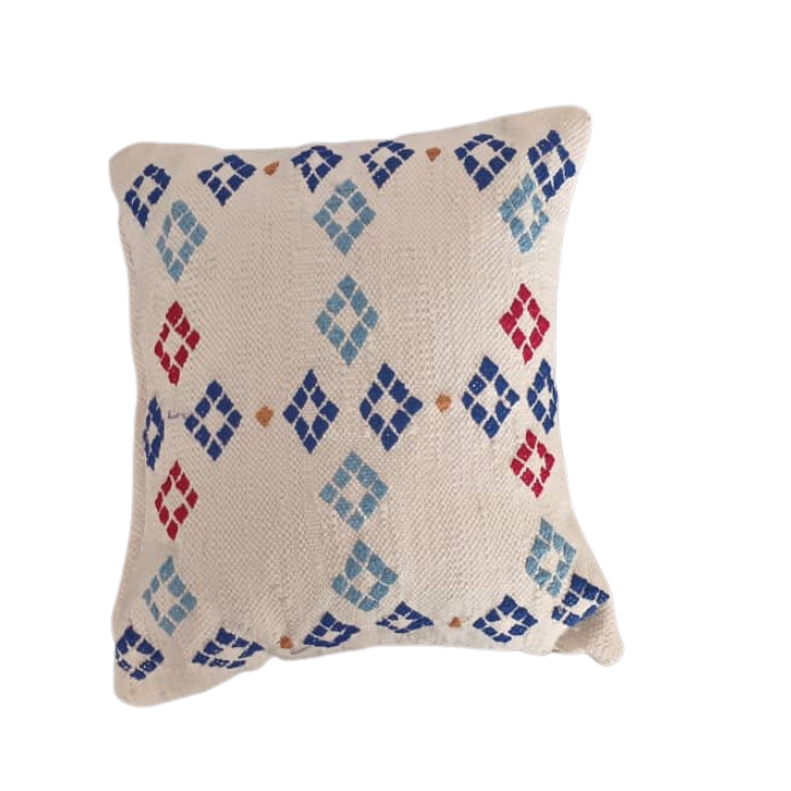 Embroidered cushion with square patterns